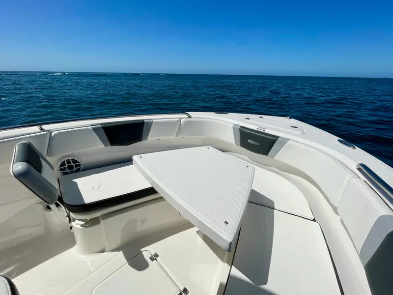 Slide: The Image of 2022 Robalo R230 Center Console boat interior with ocean view. - 28