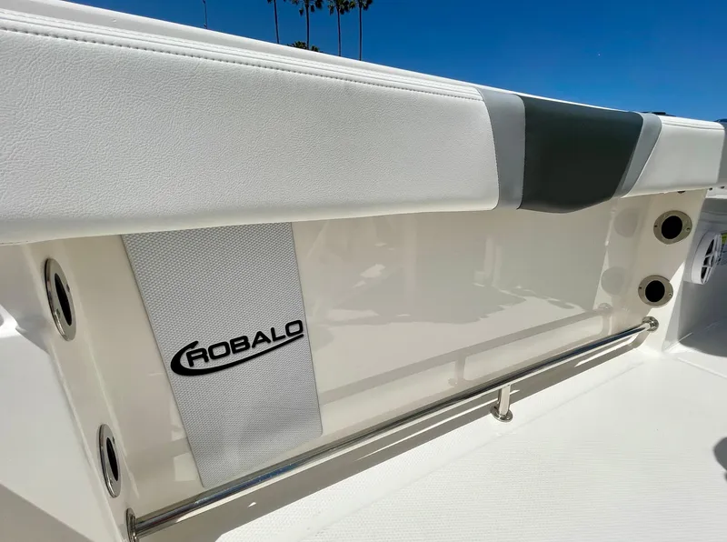 Slide: The Image of 2022 Robalo R230 Center Console boat interior with logo and sleek design. - 33