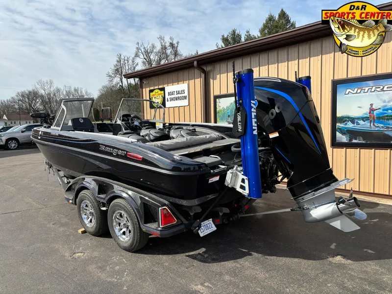Slide: The Image of 2021 Ranger 1880MS boat on trailer outside D&R Sports Center. - 2