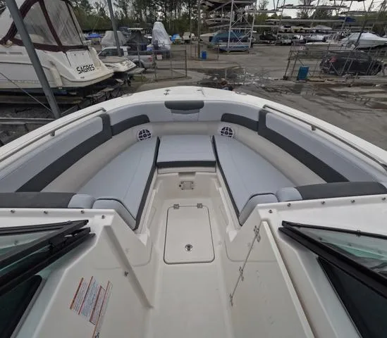 Slide: The Image of 2025 Robalo 257 Dual Console boat with spacious seating and modern design. - 43