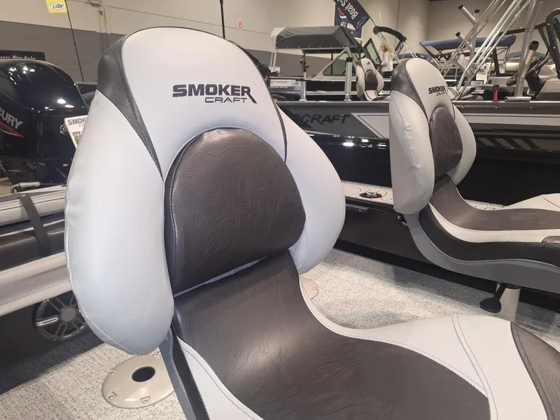 Slide: The Image of 2025 Smoker Craft Excursion 166 SC boat seats, featuring sleek design and comfortable upholstery. - 8