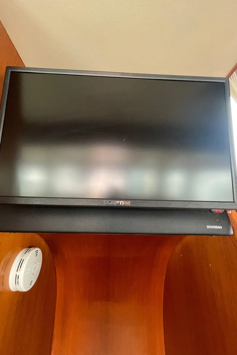 Slide: The Image of Flat-screen TV and soundbar in North Pacific 42 yacht, 2006 model. - 13