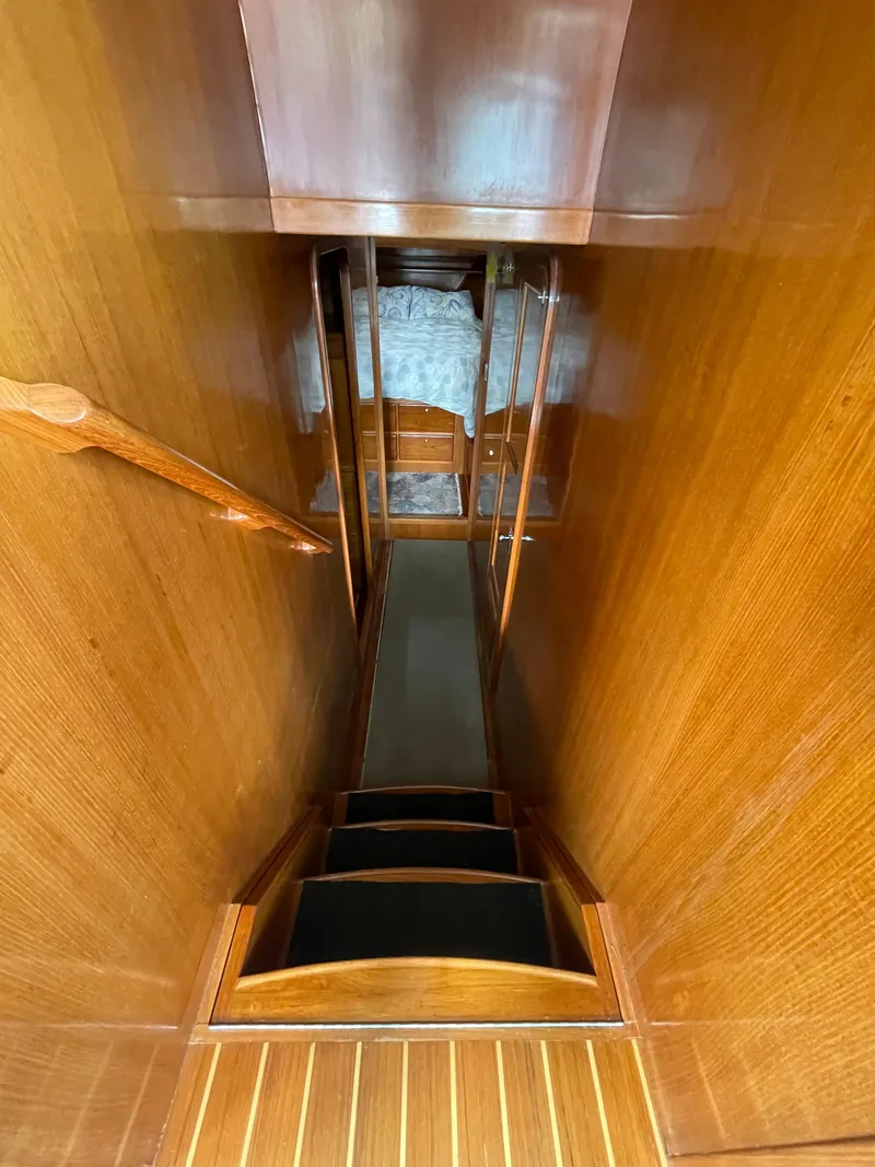 Slide: The Image of Staircase in 2006 North Pacific 42 yacht with wooden interior. - 26