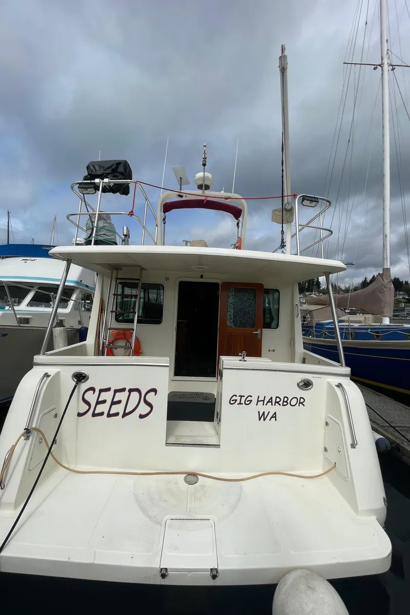 Slide: The Image of 2006 North Pacific 42 boat docked, named "SEEDS," Gig Harbor, WA. - 3