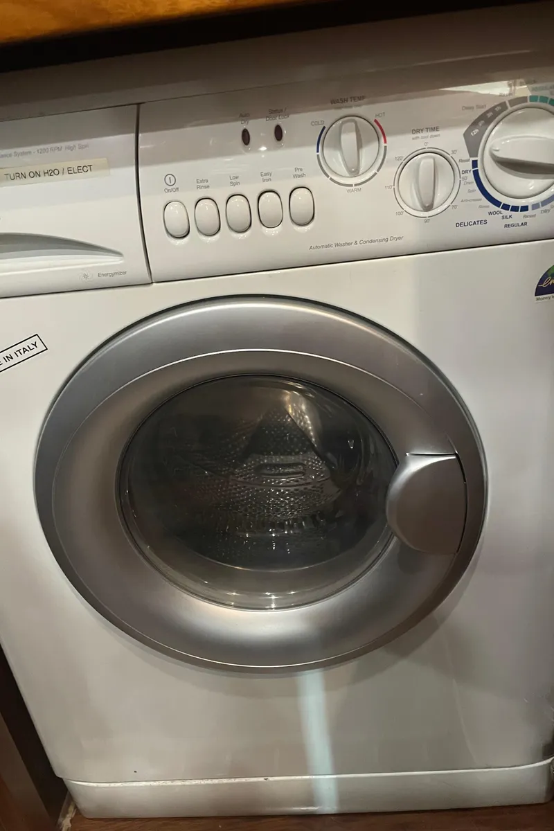 Slide: The Image of Front-loading washing machine with control dials and buttons, North Pacific 42, 2006 model. - 41