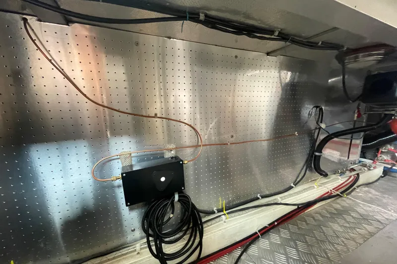 Slide: The Image of Engine room wiring and components in a 2006 North Pacific 42 boat. - 43