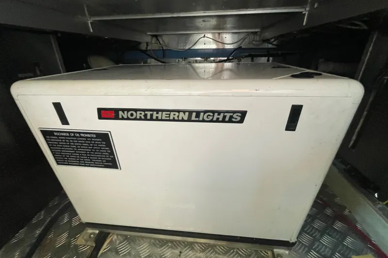 Slide: The Image of Northern Lights generator in a 2006 North Pacific 42 yacht engine room. - 44
