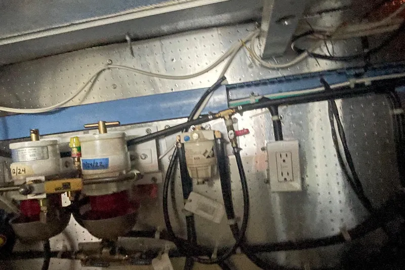 Slide: The Image of Engine room wiring and components in a 2006 North Pacific 42 boat. - 45