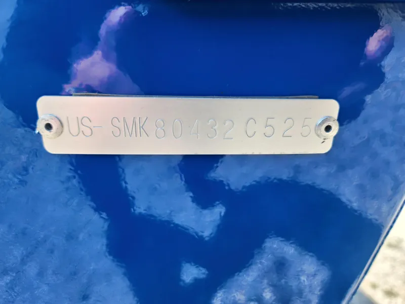 Slide: The Image of Hull identification number on blue Smoker Craft Lazer 161 boat, 2025 model. - 5