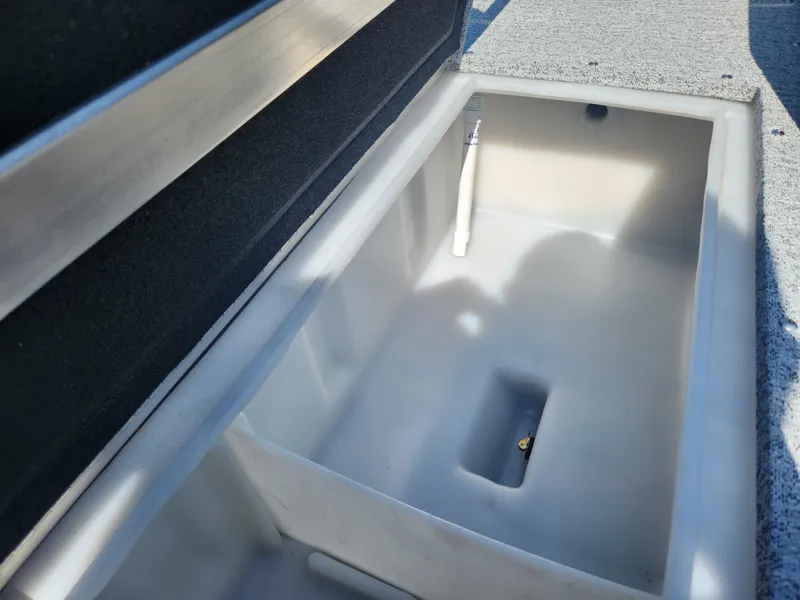 Slide: The Image of Open storage compartment in 2025 Smoker Craft Lazer 161 boat. - 8