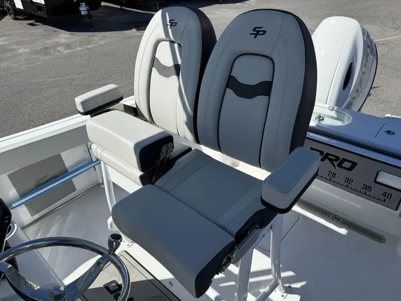 Slide: The Image of 2025 Sea Pro 230 Bay boat seats, featuring sleek design and comfortable armrests. - 11