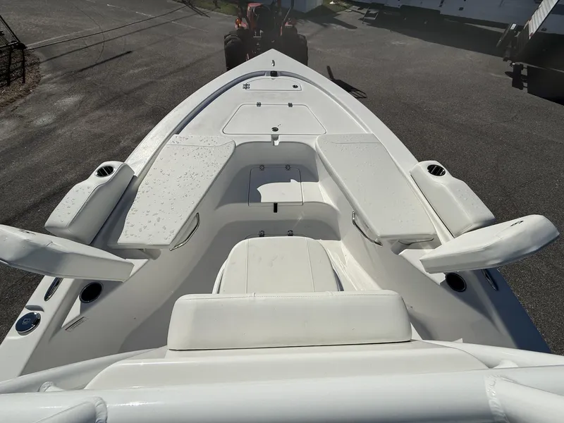 Slide: The Image of 2025 Sea Pro 230 Bay boat with spacious seating and sleek design. - 8