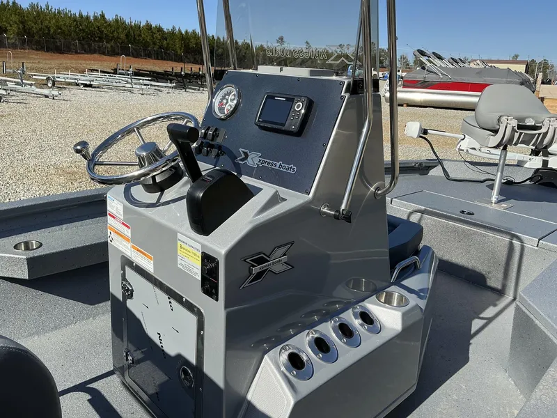 Slide: The Image of 2025 Xpress Hyper-Lift Series H20B console with steering wheel and controls. - 10