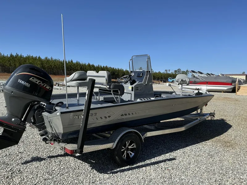 Slide: The Image of 2025 Xpress Hyper-Lift Series H20B boat with Yamaha engine on trailer. - 2