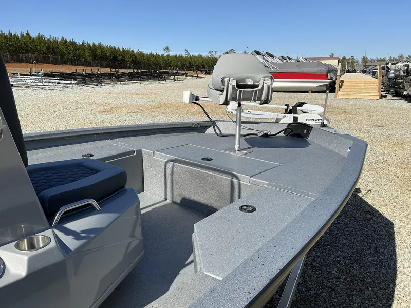 Slide: The Image of 2025 Xpress Hyper-Lift Series H20B boat with new console, featuring Minn Kota trolling motor. - 7