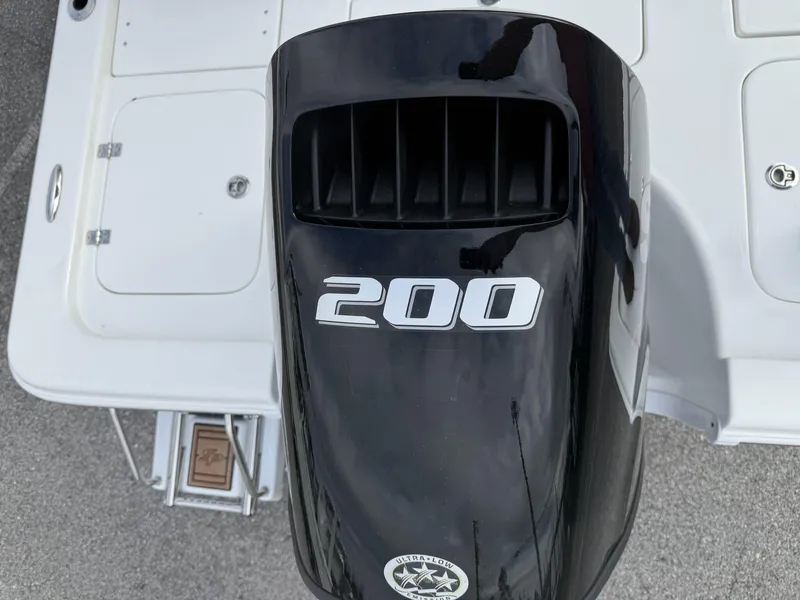Slide: The Image of Outboard motor on 2025 Sea Pro 230 Bay boat, featuring "200" horsepower. - 10