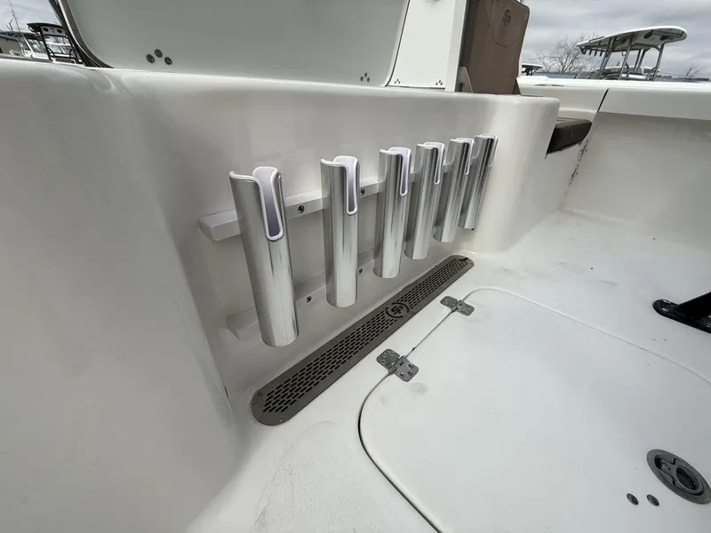 Slide: The Image of 2025 Sea Pro 230 Bay boat rod holders and deck view. - 5