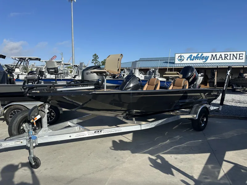 Slide: The Image of 2025 Xpress Hyper-Lift Series H18 Crappie Model boat on trailer at Ashley Marine. - 1