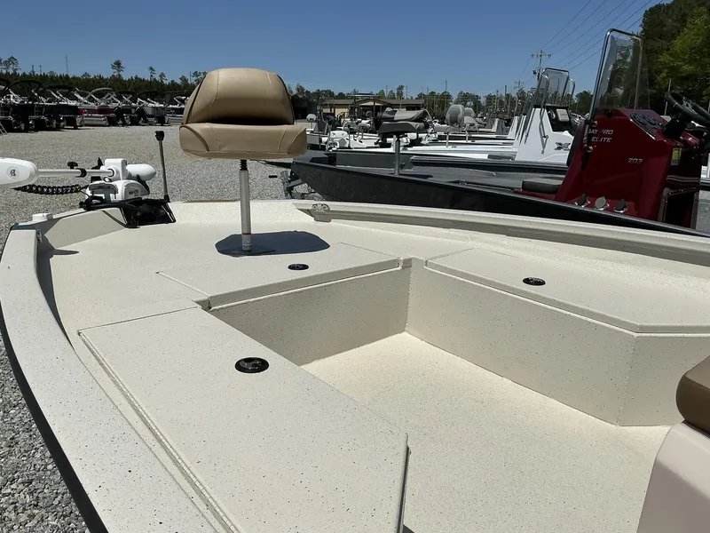 Slide: The Image of 2025 Xpress Hyper-Lift Series H22B boat with Terrova motor and stereo, beige deck view. - 3