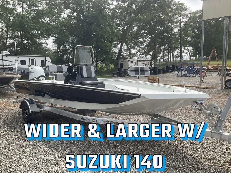 Slide: The Image of 2025 Excel Bay Pro 203 Elite boat with Suzuki 140 engine on trailer. - 1