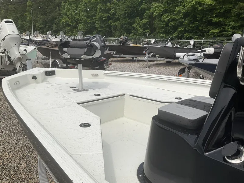 Slide: The Image of 2025 Excel Bay Pro 203 Elite boat on display, featuring spacious deck and modern design. - 5