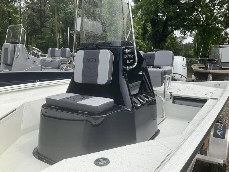 Slide: The Image of 2025 Excel Bay Pro 203 Elite boat with sleek design and modern seating. - 7