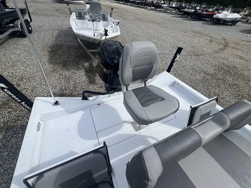 Slide: The Image of 2025 Xpress Hyper-Lift Series H20B boat with new console, featuring comfortable seating. - 5