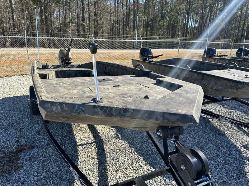 Slide: The Image of 2025 Excel Viper F4 1754 ECLIPSE boat on trailer, parked outdoors. - 7