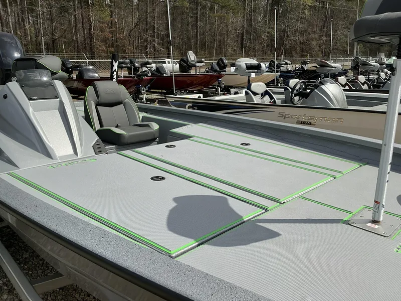 Slide: The Image of 2025 Xpress Hyper-Lift Bass Series boat with sleek design and comfortable seating. - 3