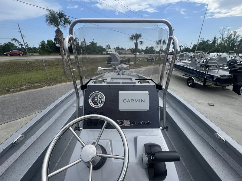 Slide: The Image of 2025 Xpress Hyper-Lift Series H22B boat dashboard with Garmin navigation system. - 13