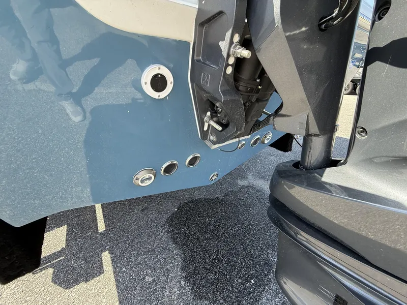 Slide: The Image of 2025 Tidewater 220 LXF boat transom and outboard motor detail. - 15