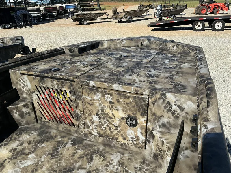 Slide: The Image of 2025 Excel Viper F4 1554 ECLIPSE boat with camouflage pattern in outdoor setting. - 5