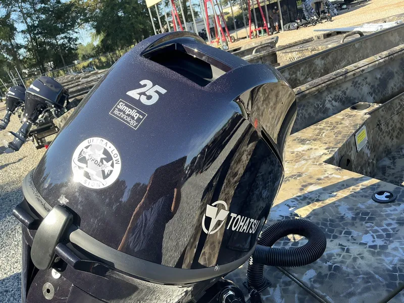 Slide: The Image of 2025 Excel Viper F4 1554 ECLIPSE boat with Tohatsu outboard motor, featuring Simplig™ technology. - 7