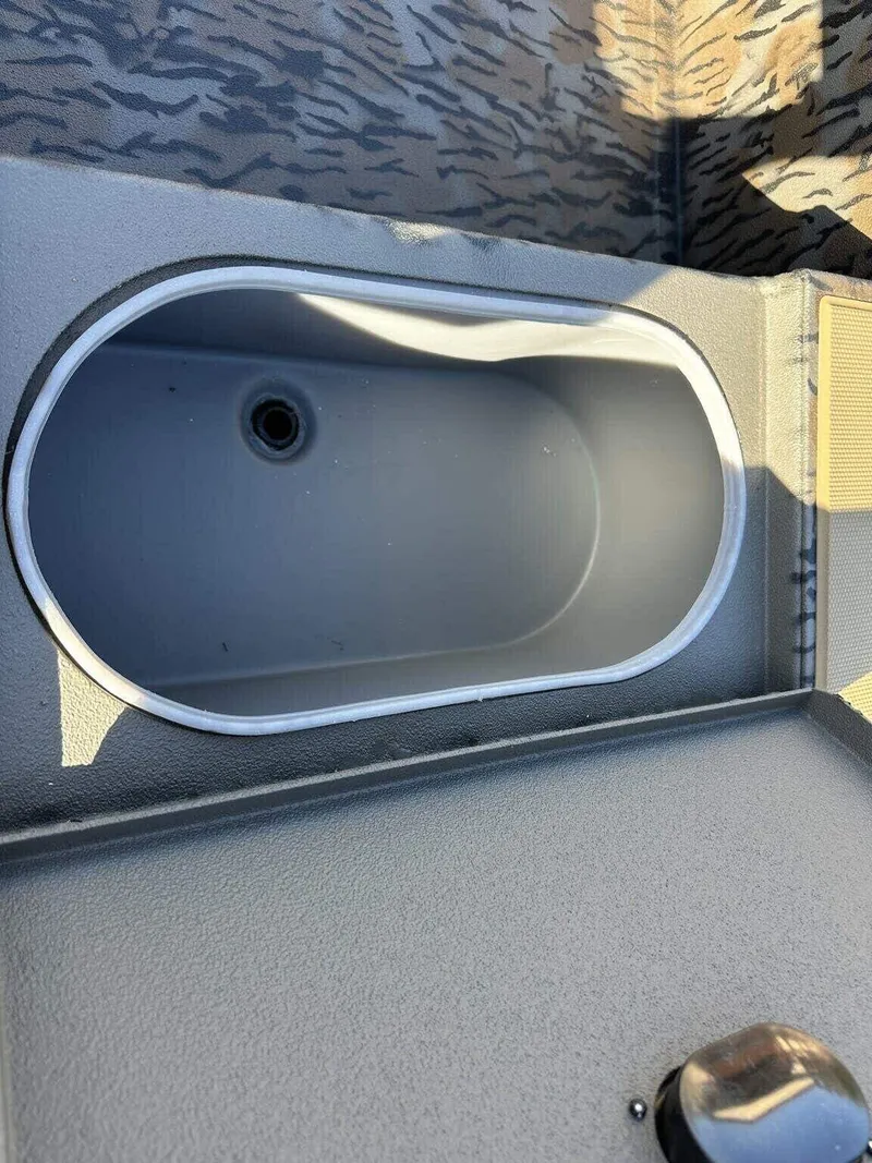 Slide: The Image of Livewell in 2025 Xpress HD Series HD16DB boat with Seadeck flooring. - 10