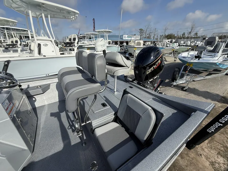 Slide: The Image of 2025 Xpress Hyper-Lift Series H20B boat with new console, featuring sleek seating and powerful engine. - 3