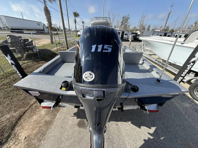 Slide: The Image of 2025 Xpress Hyper-Lift Series H20B boat with powerful 115 engine, parked outdoors. - 5