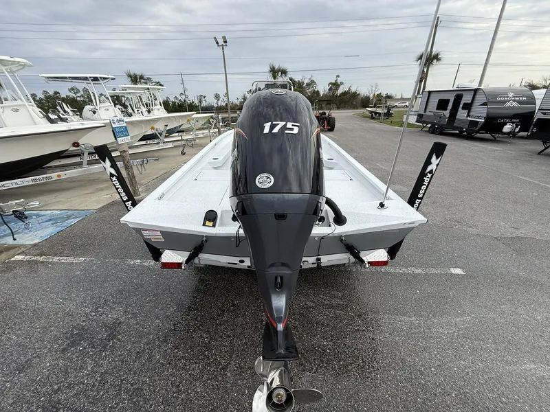 Slide: The Image of 2025 Xpress Hyper-Lift Series H22B boat with 175 horsepower engine, parked outdoors. - 3