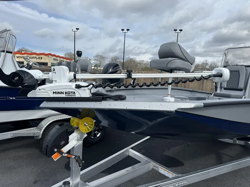 Slide: The Image of 2025 Xpress Hyper-Lift Series H22B boat with Minn Kota Terrova motor on trailer. - 7