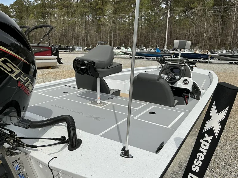 Slide: The Image of 2025 Xpress Hyper-Lift Bass Series boat with sleek design and modern features. - 10