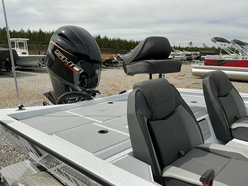 Slide: The Image of 2025 Xpress Hyper-Lift Bass Series boat with Yamaha VMAX engine, featuring sleek seating design. - 9