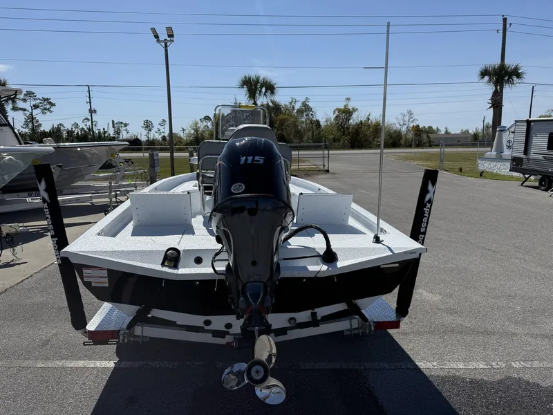 Slide: The Image of 2025 Xpress Hyper-Lift Series H20B boat with 115 horsepower engine, parked outdoors. - 3