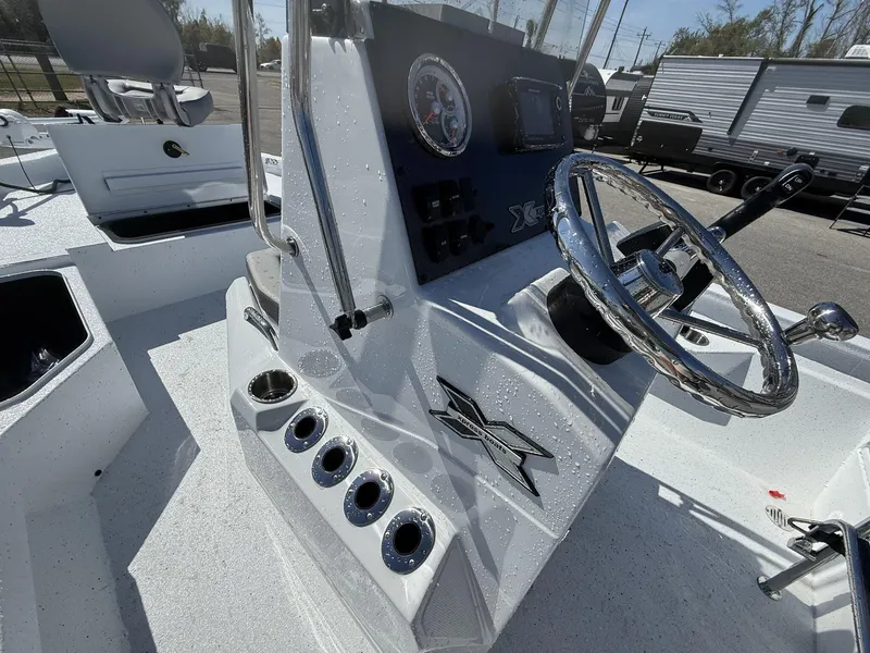 Slide: The Image of 2025 Xpress Hyper-Lift Series H20B console with steering wheel and controls. - 8