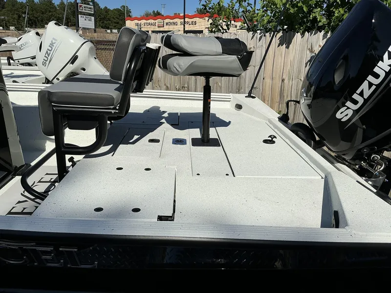 Slide: The Image of 2025 Excel Bay Pro 203 Elite boat with Suzuki motor, featuring spacious seating and storage. - 5