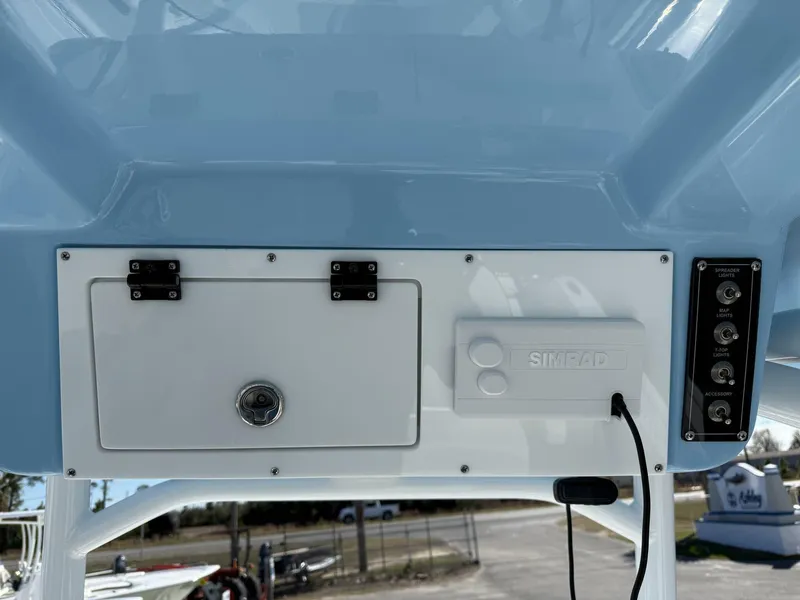 Slide: The Image of 2025 Sea Pro 222 boat console with Simrad electronics and control panel. - 10