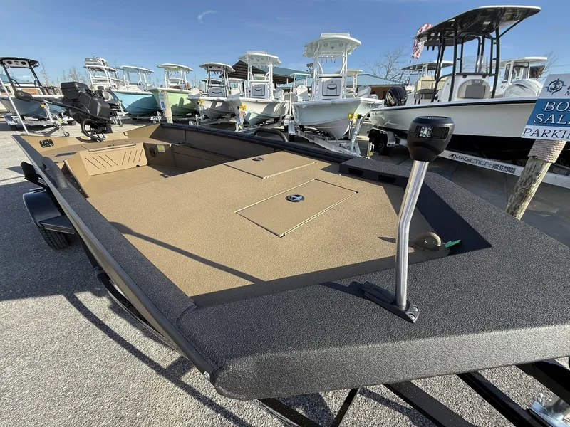 Slide: The Image of 2025 Excel 1754 Eclipse boat with Mud Buddy Mini 40, displayed at a boat sale. - 3