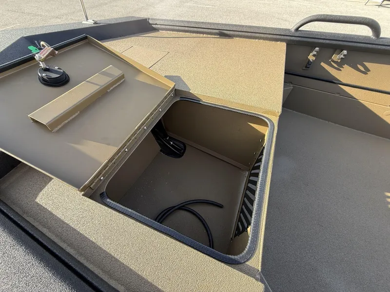 Slide: The Image of 2025 Excel 1754 Eclipse boat storage compartment with open lid and visible wiring. - 5