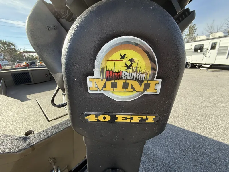 Slide: The Image of Close-up of Mud Buddy Mini 40 EFI motor on Excel 1754 Eclipse boat. - 7