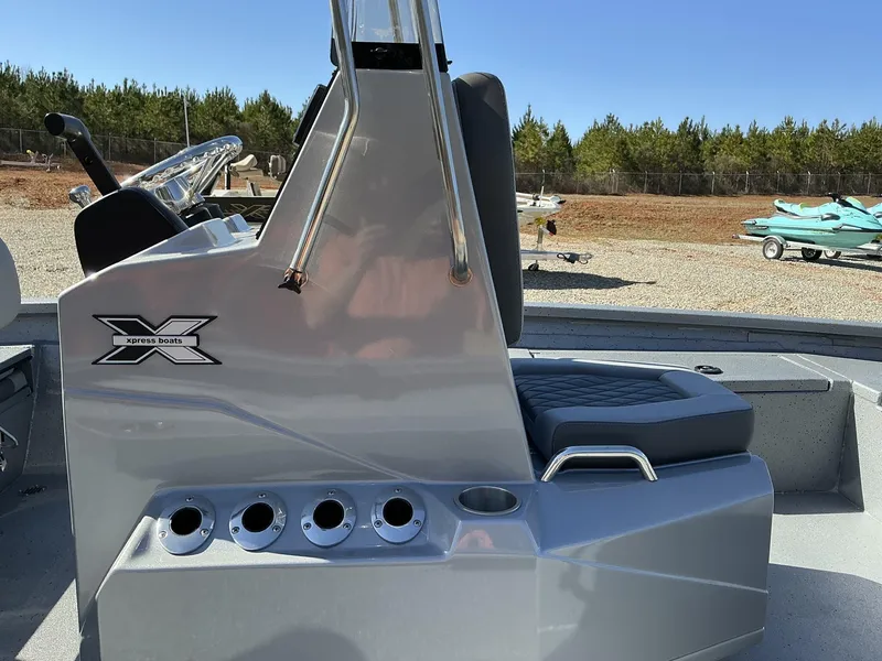 Slide: The Image of 2025 Xpress Hyper-Lift Series H20B console, sleek design, silver finish, outdoor setting. - 6