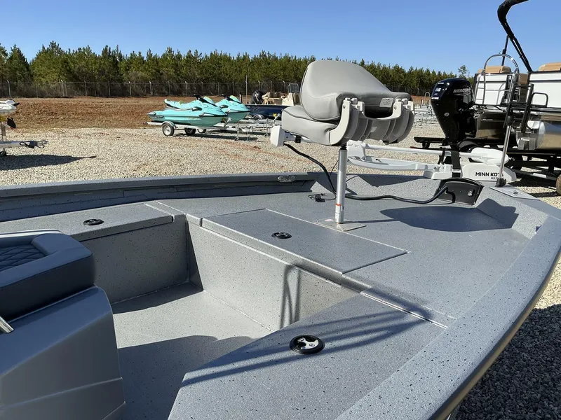 Slide: The Image of 2025 Xpress Hyper-Lift Series H20B boat with new console, featuring a Minn Kota motor. - 7