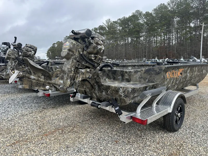 Slide: The Image of 2025 Excel Shallow Water F4 1754 F86 HDR5000 boat on trailer, camo design, outdoor setting. - 10